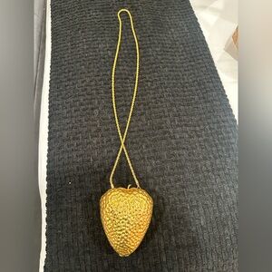 Gold metal strawberry bag with long gold strap